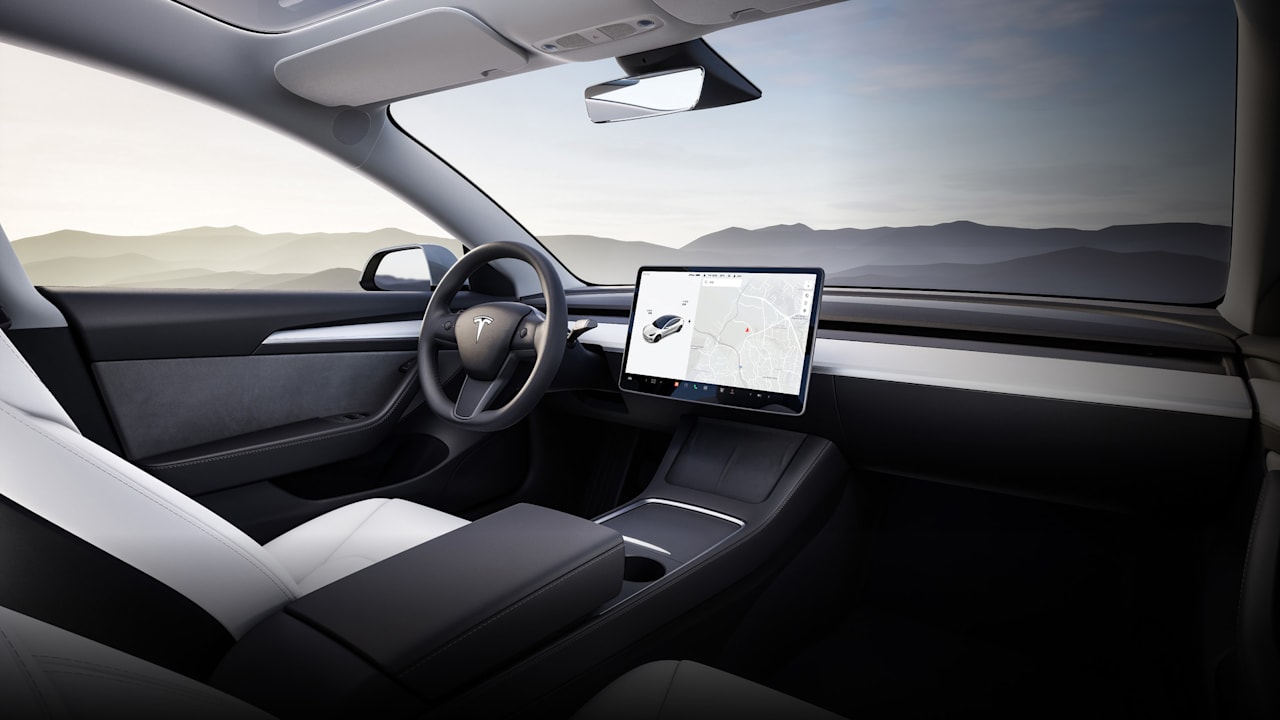 Tesla minimalist interior with central touchscreen
